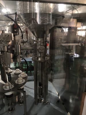 練乳チューブ充填・密封包装機