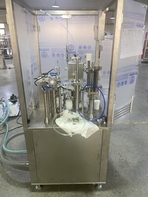 製薬会社用の自動注射器の詰め機
