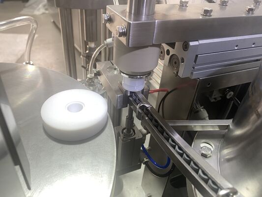 製薬会社用の自動注射器の詰め機