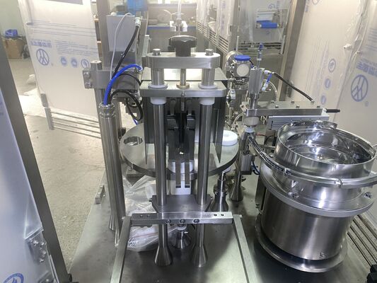 製薬会社用の自動注射器の詰め機