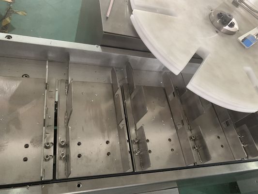 びん高速カートンに入れる機械4折目のまめカートンに入れる機械